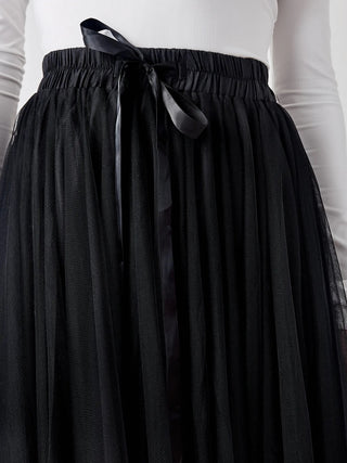 Maxi-length ,Black Tutu Skirt featuring a thin elastic waistband and flared cut with ruffle-effect details.