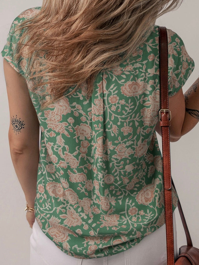 Back view of light green floral blouse