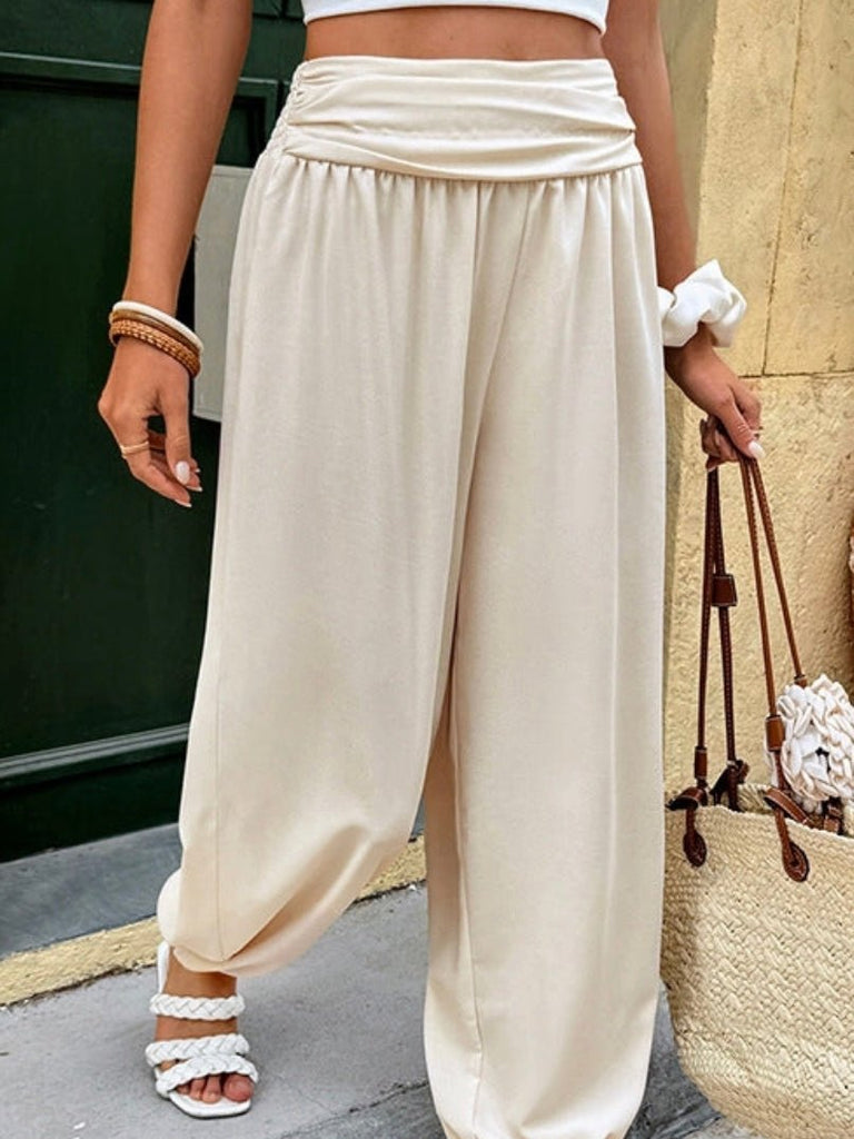 Woman wearing neutral beige lightweight lounge pants