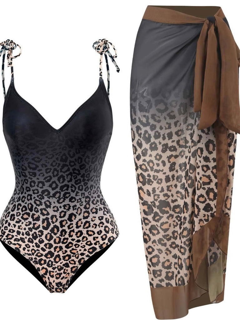 A swim set with a one-piece swimsuit in leopard print with gradient from black to tan, and a matching sheer chiffon sarong wrap.