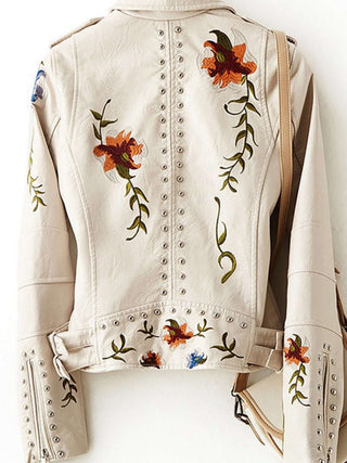 See the back of the Chevelle Jacket in White with a  Moto-Style Fit and  floral embroidery with silver studs.