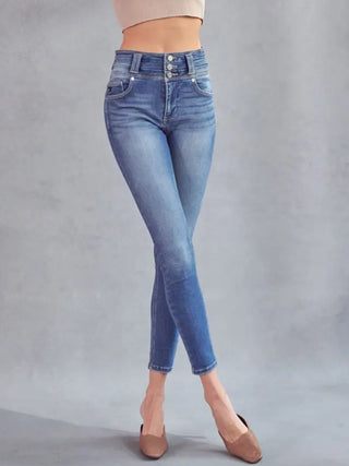 Skinny Triple Button Kancan Jeans, high rise, medium stone rinse, and a ton of stretch held up by triple stitch details.