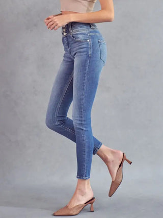 Skinny Triple Button Kancan Jeans, high rise, medium stone rinse, and a ton of stretch held up by triple stitch details.