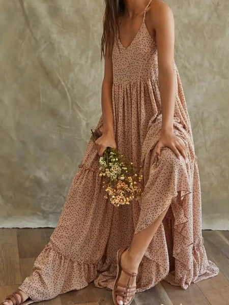 Light  Taupe , V -Neck , Lined  Ruffle  Maxi - Dress  with woven chiffon and  a dot print  throughout and has a Cross Back.