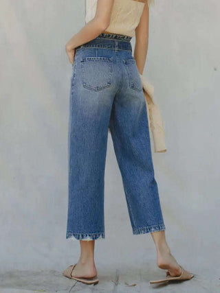 Super Stretch Denim High Rise wide-leg paper bag waist belted jeans have a relaxed thigh and widens down leg for roomy fit. Also has 5 pocket single-button zip -fly closure.