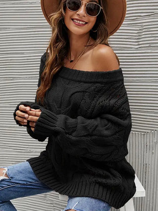 Black Knit Relaxed fit boatneck off The shoulder Sweater with a dash of Boho Chic Flair !