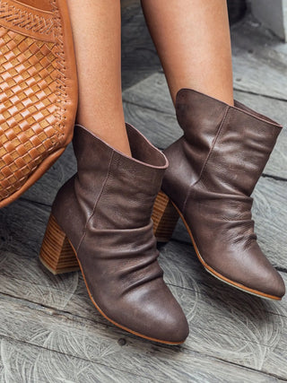 Brown Pull-on style leather boots, featuring versatile fold over option, leather lining and insole, with slightly padded footbed and hand cut wooden heel.