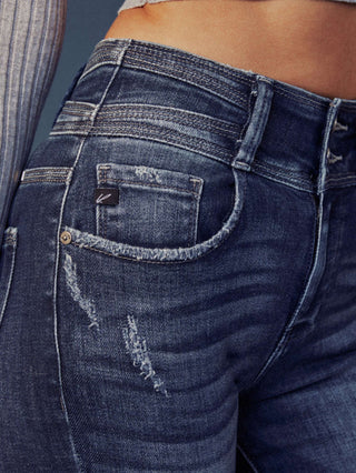 Super Skinny Fit, High Rise Jeans with heavy whiskering, and a double waistband, featuring classic five-pocket design, double-button front, and zip-fly closure.