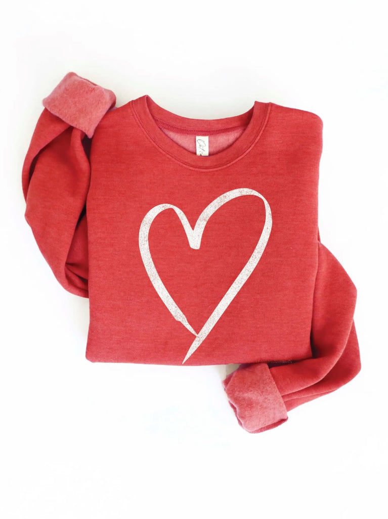 Folded Up Red Heart Sweatshirt - Cozy romance in heather-red with a beautiful white heart graphic. 