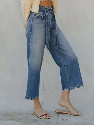 High Rise wide-leg paper bag waist belted jeans have a relaxed thigh and widens down leg for roomy fit. Also has 5 pocket single-button zip -fly closure.