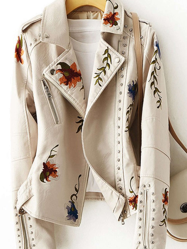 Chevelle Jacket hanging in white - Floral Elegance and Moto Chic at Oak&Pearl Clothing Co.