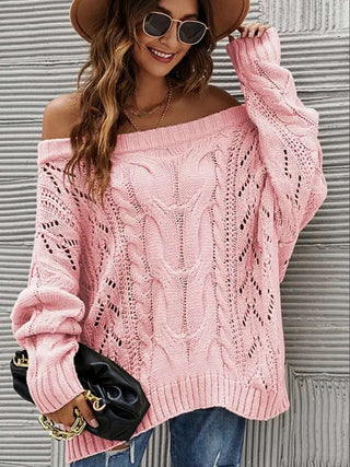 Cozy Knit Erica Off The Shoulder Sweater in Pink showcases your shoulders, enhancing the playful and dynamic nature of your look.