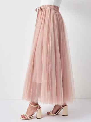 Maxi-length , Pink Tulle ,Tutu Skirt with flattering Flare and Ruffle Details with tie at the front.