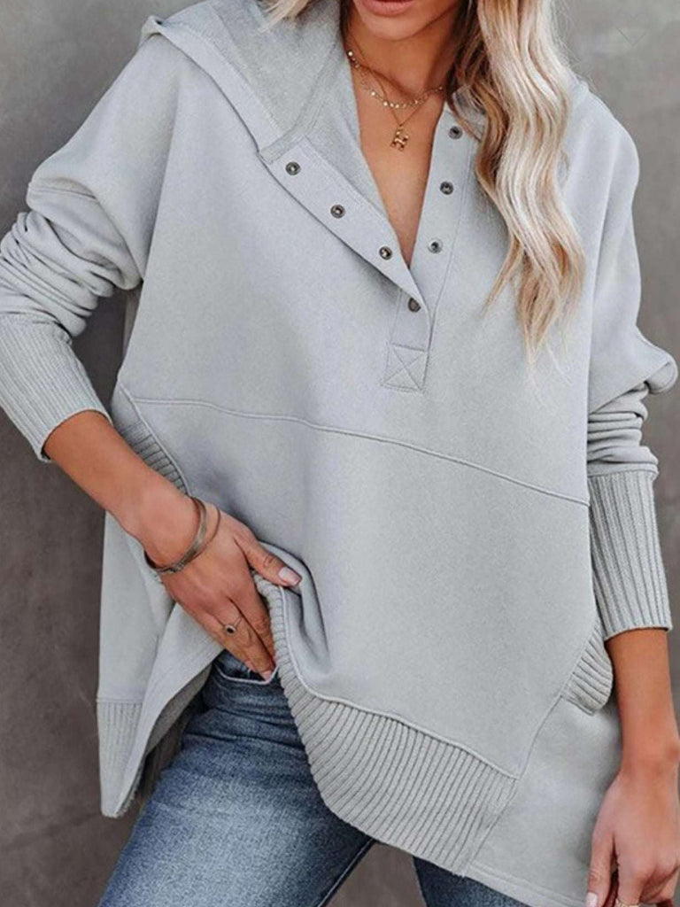 Grey Oversized Henley Hoodie with Front snaps, ribbed cuffs with long sleeves and convenient pockets.