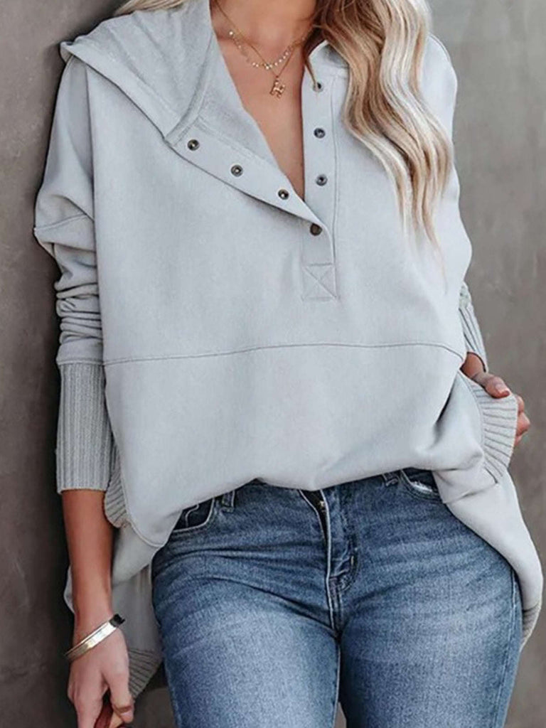 Grey Oversized Henley Hoodie with Front snaps, ribbed cuffs with long sleeves and convenient pockets.